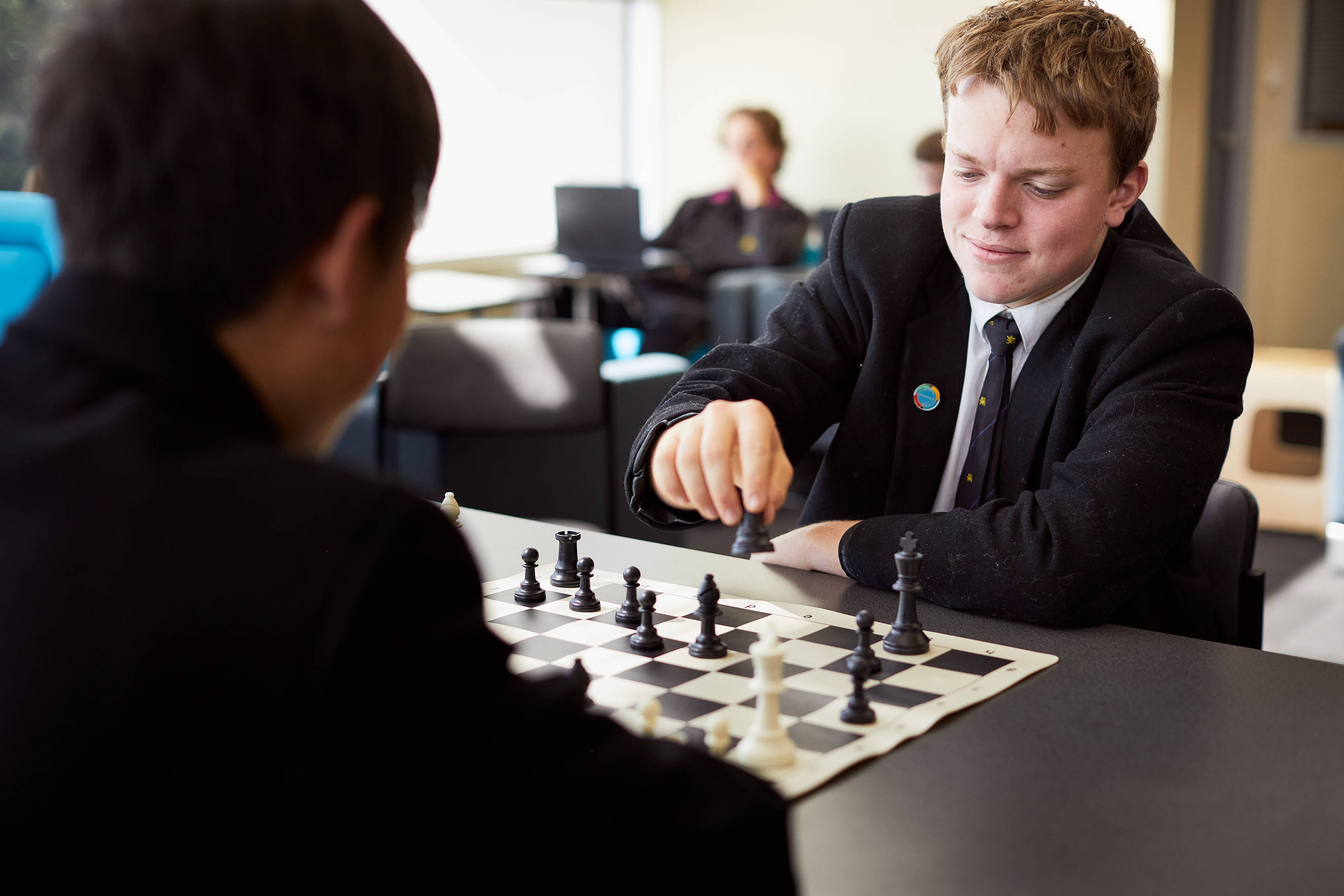 Senior School students playing chess.